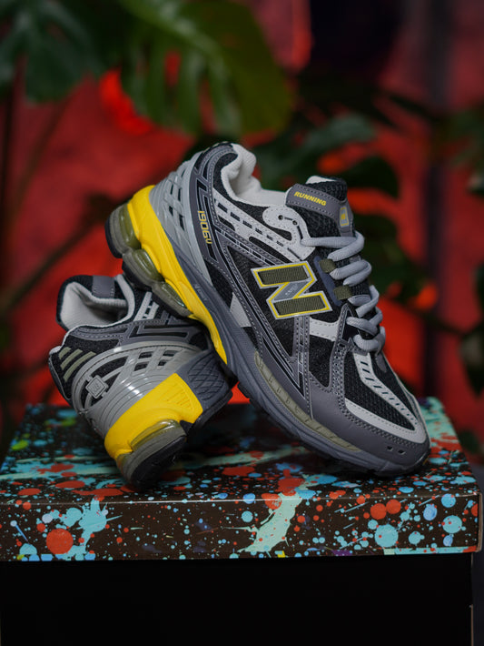New Balance 1906u - Gris, Amarillo