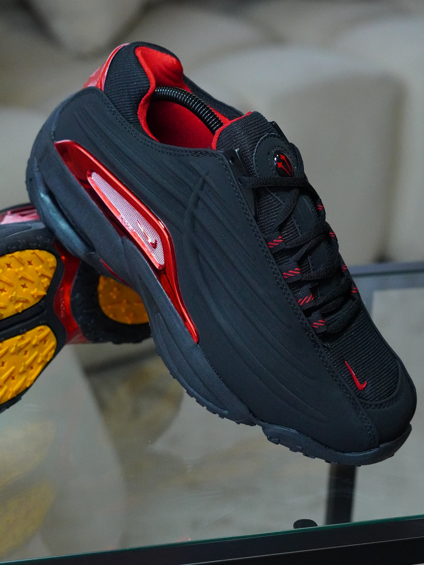 NIKE NOCTA STEP 2 NEGRO - ROJO METALIC