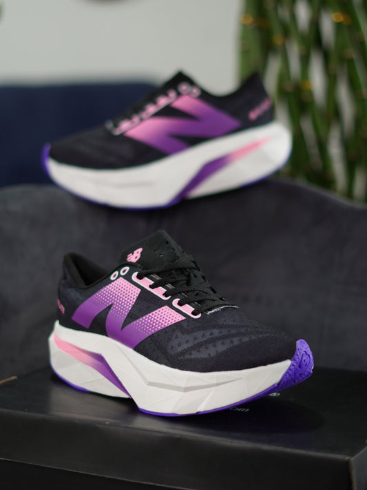 New Balance FuelCell Rebel v4 / Purple / Black