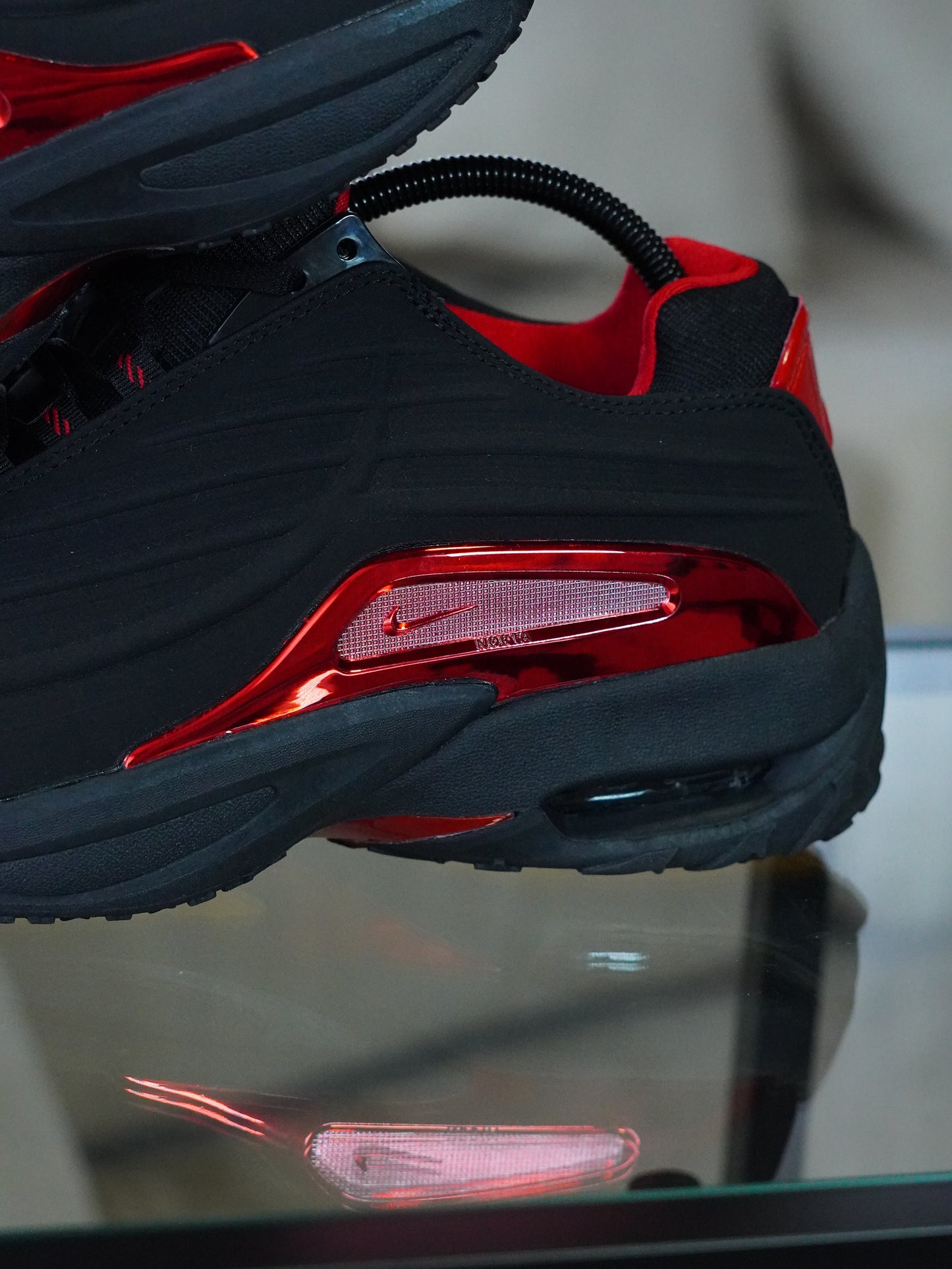 NIKE NOCTA STEP 2 NEGRO - ROJO METALIC