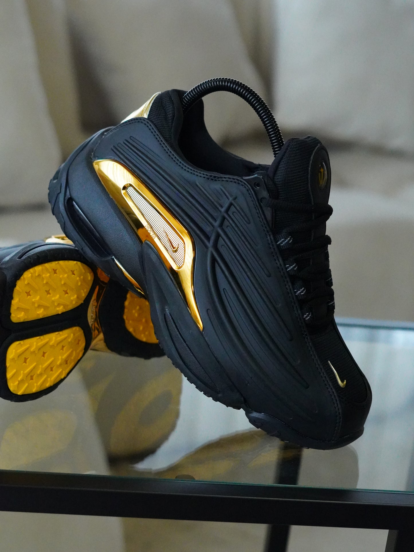 NIKE NOCTA STEP 2 NEGRO DORADO