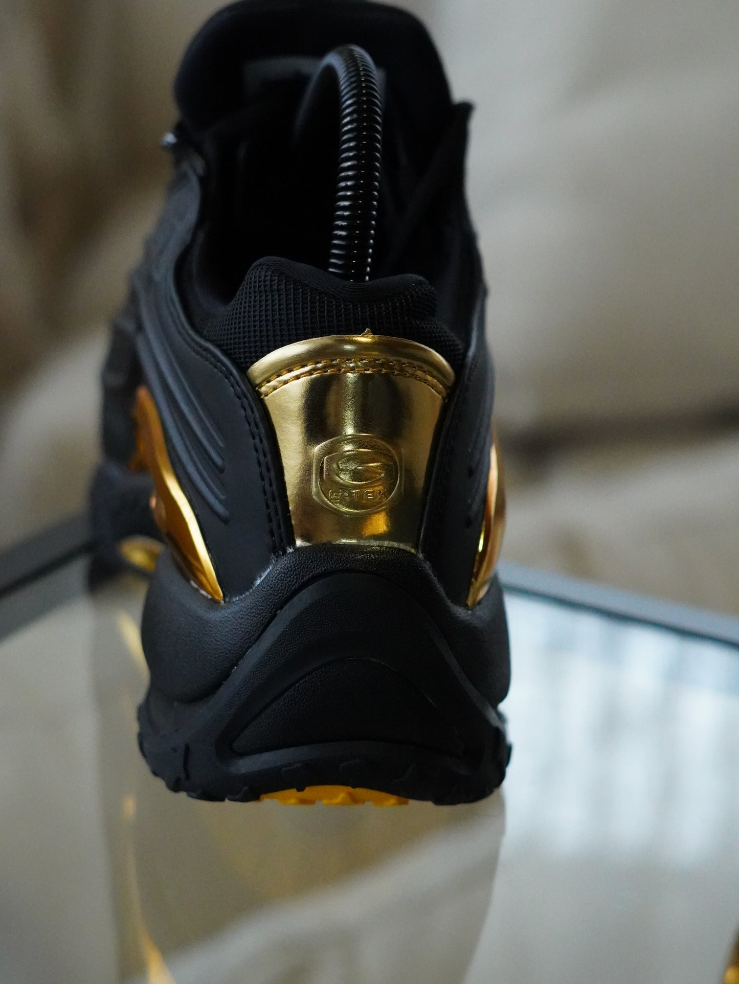 NIKE NOCTA STEP 2 NEGRO DORADO