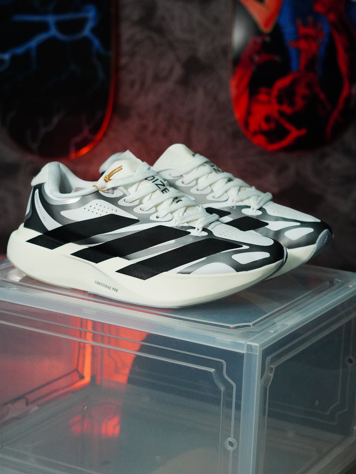 adidas Adizero Evo SL Exo en color blanco y negro