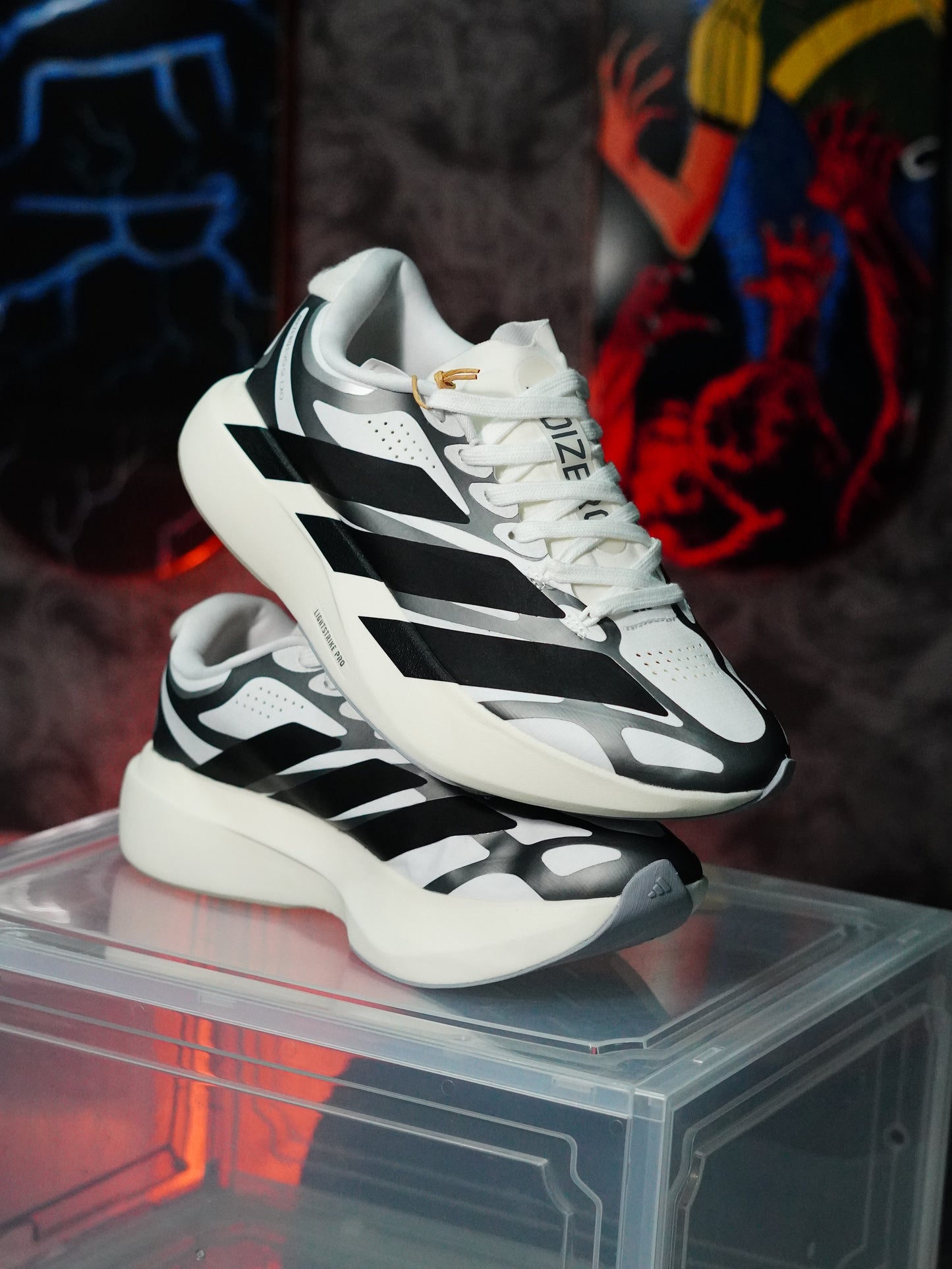 adidas Adizero Evo SL Exo en color blanco y negro