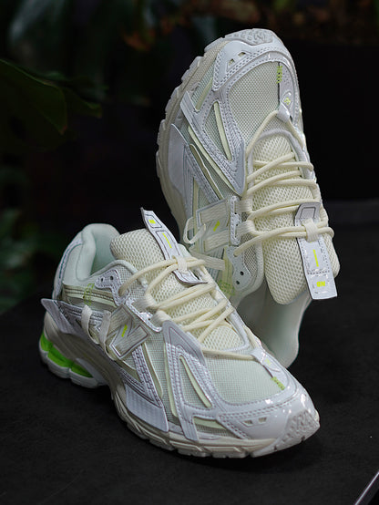 New Balance 1906A - Blanco con Mint Flash, Plata metalizada