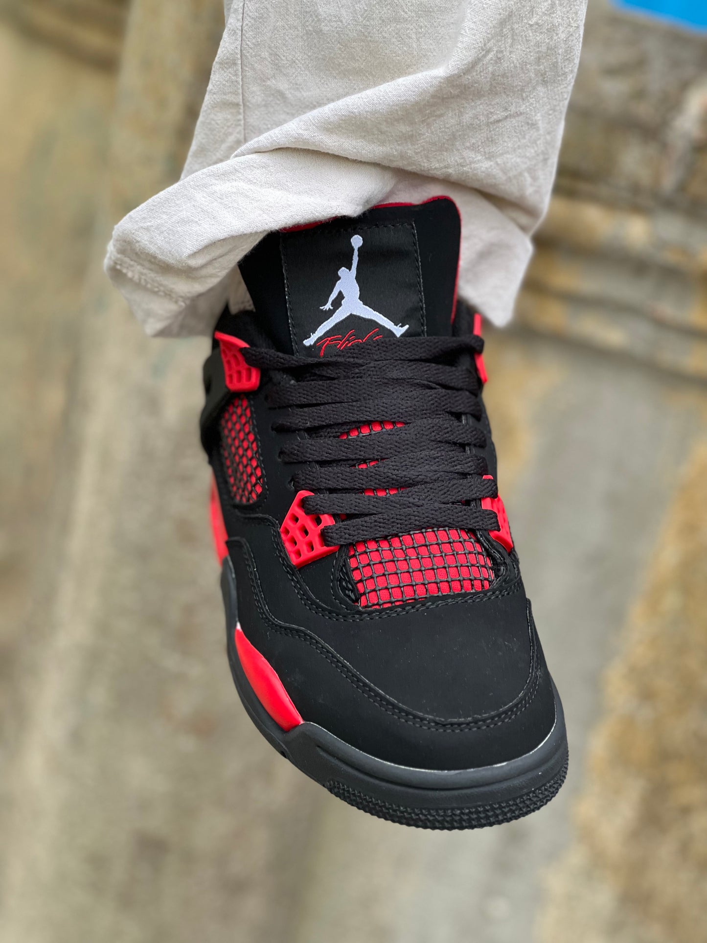 Jordan 4 "Red Thunder"