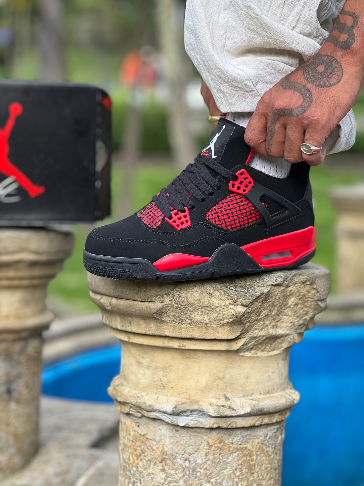 Jordan 4 "Red Thunder"